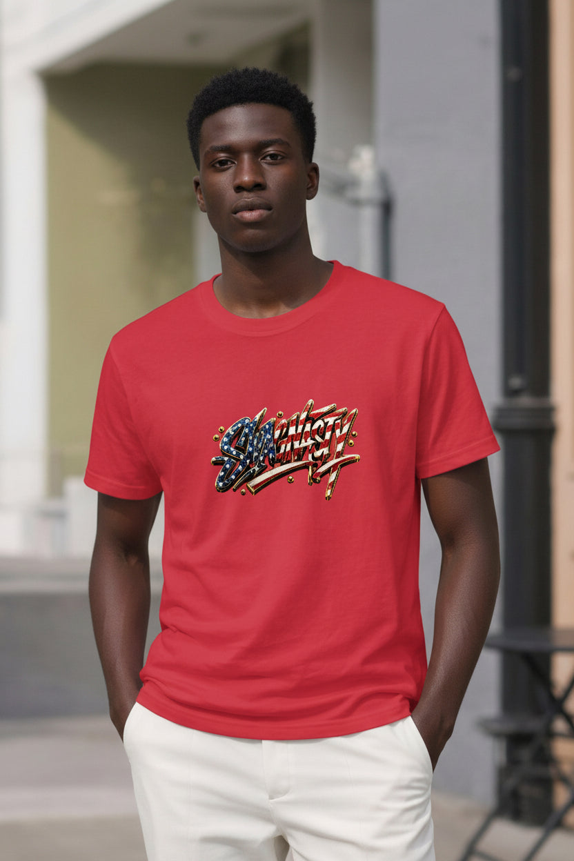 Person wearing a red t-shirt with a graphic design outdoors